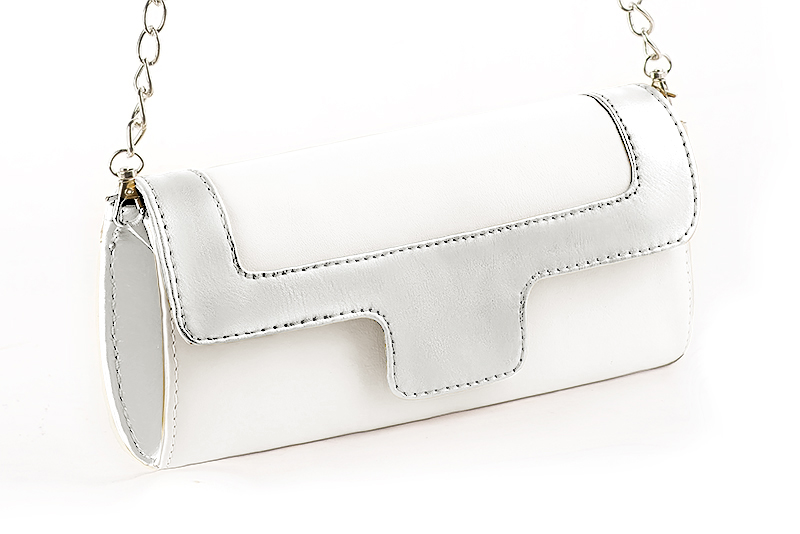 Handcrafted women's elegant clutch in premium pure white and silver leather. Perfect for weddings, ceremonies, and parties.  
                Choose from our luxurious collections of leather and fabric to perfectly match your clutches to your outfits.